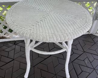 Excellent selection of wicker patio furniture includes this table.
