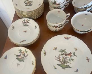 Closer view of the set of hand-painted Herend Rothschild Bird pattern dinnerware.