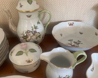 Closer view of the set of hand-painted Herend Rothschild Bird pattern dinnerware.
