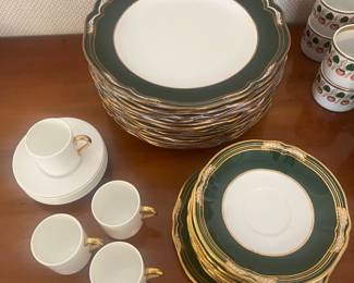 Set of 13 Spode dinner plates, 12 bread and butter plates, saucer, and salad plate (left in photo); set of four Coalport bone china cup and saucer sets.