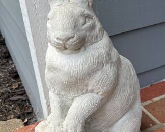 Concrete rabbit statue.