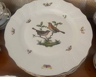 Closer view of the set of hand-painted Herend Rothschild Bird pattern dinnerware.