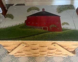 Picnic basket featuring Warren Kimble Americana folk art depicting a iconic round red barn.