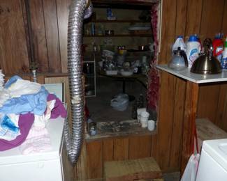 Entrance to kitchenware area, Loaded basement check all pictures to see what's down there.  Please bring a flashlight expect to be very careful walking over a bumpy surface!!
