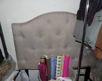 Basement with lots of assorted things including headboard!!