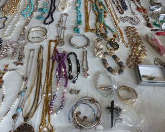 Lots of costume jewelry and watches including Gucci, Michele & Rado