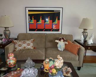 Sofa, side tables, accent pillows Cabbage Pach doll, signed Milton Glaser poster
