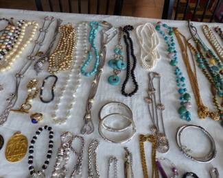 Lots of costume jewelry and watches including Gucci, Michele & Rado