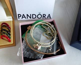 Lots of costume jewelry and watches including Gucci, Michele & Rado