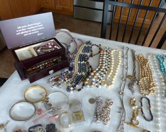 Lots of costume jewelry and watches including Gucci, Michele & Rado