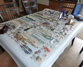 Lots of costume jewelry and watches including Gucci, Michele & Rado