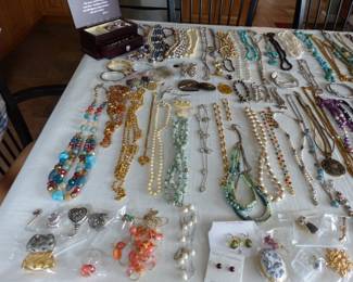 Lots of costume jewelry and watches including Gucci, Michele & Rado