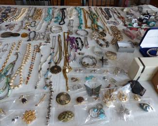 Lots of costume jewelry and watches including Gucci, Michele & Rado