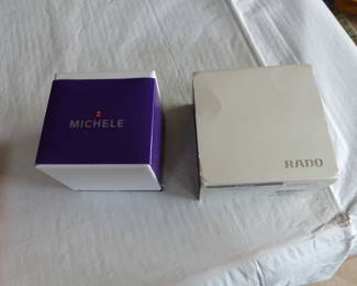 Lots of costume jewelry and watches including Gucci, Michele & Rado