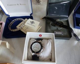 Lots of costume jewelry and watches including Gucci, Michele & Rado