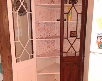 Ask . 2500.00 corner cabinet original glass
