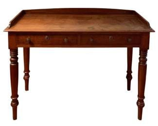 118 - Wood Table w/ 2 Drawers 33"x42.5"x18.5" (Description): Wood table featuring two drawers with brass hardware. The table has turned legs and a gallery back. Measures 33 inches wide by 4.5 inches deep by 18.5 inches tall.