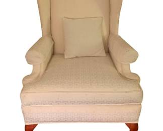 114 - Vintage Chair 43"x33"x30" (Description): Vintage chair featuring classic wingback styling with rolled arms and cabriole legs. Measures 43 inches high by 33 inches wide by 30 inches deep.