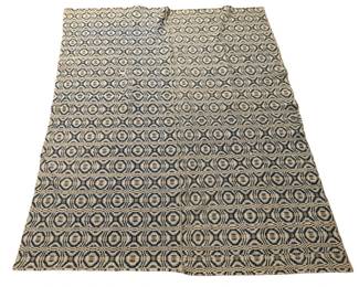 526 - Vtg Blue & Cream Woven Coverlet Blanket (Description): Vintage woven coverlet blanket featuring a traditional geometric pattern in navy blue and cream. The textile displays a classic American overshot weave design with repeating circular medallions and intricate interlocking motifs. Measures 88.5 inches by 64.5 inches.