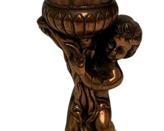 129 - Metal Cherub Compote Vase 10" (Description): A metal cherub compote vase measuring 10 inches in height. The piece features a fluted urn-form bowl supported by a figural base.