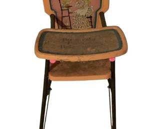 490 - Vtg Painted Metal Doll Highchair 24"x12"x11" (Description): Vintage doll highchair featuring a charming hand-painted design on the backrest depicting two children in period dress. The metal and pressed wood construction has a peach and pink color scheme with teal trim accents. The chair includes a removable tray. This classic toy shows wear consistent with age and play. Measures 24 inches high by 12 inches wide by 11 inches deep. Shows age-appropriate wear consistent with vintage