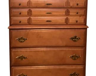 423 - Vtg Maple Chest of Drawers (Description): Vintage maple chest of drawers featuring a distinctive two-tier design. Measures 51 inches by 36 inches by 17.5 inches.