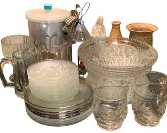 80 - Assorted Glassware, Pottery & Kitchen Items (Description): An assorted lot of glassware, pottery, and kitchen items. The collection includes a pressed glass punch bowl with diamond pattern, clear glass pitcher with etched floral design, ribbed glass beer mug, aluminum ice bucket with lid, decorative serving plates with platinum trim, opalescent dessert plates, small pressed glass bowls, ceramic vases in earth tones, a white ceramic figurine, and various other glass serving
