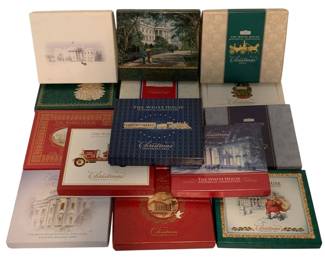 443 - Collector's White House Christmas Ornaments (Description): A collection of White House Historical Association Christmas ornaments, each presented in its original decorative gift box. The lot includes ornaments from various years, with boxes featuring different designs depicting the White House and holiday scenes. The ornaments come with their original packaging and documentation.