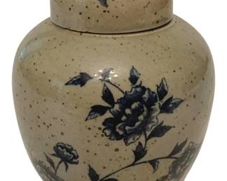 208 - Blue & White Floral Ginger Jar w/ Lid 5" (Description): Ceramic ginger jar with lid featuring a cream or beige speckled ground decorated with hand-painted blue floral motifs including peonies and leafy branches. The jar has a classic rounded form with a domed lid. Measures 5 inches tall.