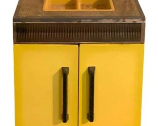 429 - Sears Toy Sink 28"x18"x15" (Description): Sears toy sink in yellow and brown metal construction. This vintage children's play kitchen piece features a double basin sink with plastic insert, faucet with two handles, and a two-door cabinet below with black handles. The piece shows age-appropriate wear consistent with vintage toys. Measures 28" x 18" x 15".