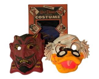 495 - Ben Cooper Halloween Masks & Costume - as is (Description): Lot of vintage Ben Cooper Halloween masks including a red devil mask with yellow horns and detailing, and a character mask depicting an elderly figure with white hair and glasses with an orange duck-like bill. Also included is an Authentic Walt Disney Character Costume box in orange with Disney character illustrations, containing a blue costume.