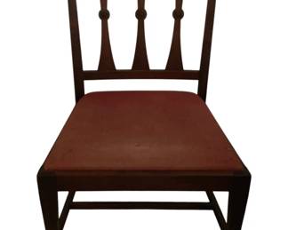 464 - Vtg Mahogany Side Chair w/ Upholstered Seat (Description): Vintage mahogany side chair featuring a distinctive three-splat back design with decorative turned details. The chair has an upholstered seat in a burgundy fabric and rests on tapered square legs connected by stretchers with spade feet. Measures 36"x 22" x 20". Cushion shows wear & may have a hole consistent with aging.