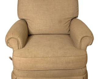 247 - Beige Upholstered Swivel Rocker Recliner (Description): A comfortable swivel rocker recliner upholstered in a neutral beige linen-weave fabric. The chair features a padded back cushion, rolled arms with piping detail, and a coordinating skirted base. Measures 36 inches wide by 34 inches deep by 39 inches high. some staining