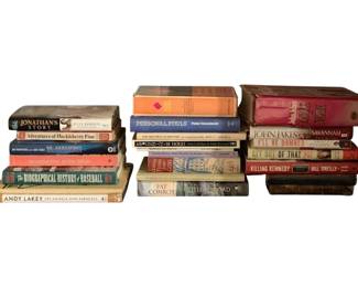 229 - Assorted Books Fiction & Non-Fiction Lot (Description): A collection of assorted books spanning fiction and non-fiction genres. The lot includes titles such as Jonathan's Story, Adventures of Huckleberry Finn, The Biographical History of Baseball, Andy Lakey, Art Angels and Miracles, Personal Fouls by Peter Golenbock, Around the World in 18 Holes, Pat Conroy's South of Broad, John Jakes' Savannah and North and South series, I'll Be Damned, Get Out of That Pit, and