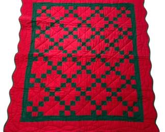519 - Vtg Red & Green Patchwork Quilt 60"x48" (Description): Vintage handmade patchwork quilt in festive red and green colors. Features a traditional Irish Chain or Double Nine Patch pattern with green squares arranged on a red background. The quilt has a scalloped edge with green binding and displays hand-quilted diagonal stitching throughout. Measures 60 inches by 48 inches.