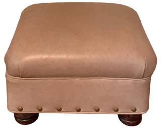 154 - Vintage Ottoman 13"x18"x16" (Description): Vintage ottoman featuring upholstered construction with nailhead trim detail and turned wooden bun feet. Measures 13 inches by 18 inches by 16 inches.