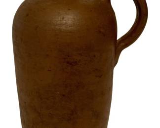 159 - Stoneware Jug 8"x6" (Description): Stoneware jug with a single handle. Measures 8 inches tall by 6 inches wide.