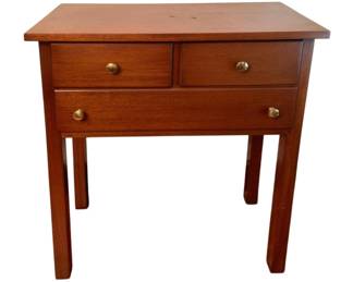 94 - 3-Drawer Stand 36.5"x32"x15" (Description): Three-drawer stand in warm mahogany finish featuring two smaller drawers above a single larger drawer, each fitted with brass knob pulls. The piece stands on straight square legs in a clean, mid-century style. Measures 36.5" x 32" x 15".