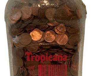 415 - Jar of Pennies in Vtg Tropicana Bottle 10"