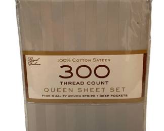 411 - Royal Opulence 100% Cotton Queen Sheet Set (Description): Royal Opulence 300 thread count queen sheet set. Made of 100% cotton sateen with fine quality woven stripe pattern. Features deep pockets. New in original packaging.
