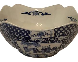 213 - Blue & White Chinoiserie Square Bowl 5"x9.5" (Description): A decorative blue and white porcelain bowl featuring a square form with a scalloped rim. The exterior is adorned with traditional Chinese figural scenes depicting figures in a garden setting, along with lattice patterns and scrollwork designs. The interior features a subtle decorative motif. Unsigned. Measures 5 inches by 9.5 inches.