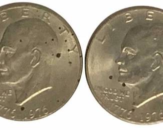 83 - 2 Bicentennial Eisenhower Dollars (Description): A lot of two Bicentennial Eisenhower dollars. These 1976 commemorative coins feature the dual date 1776-1976, celebrating the United States' 200th anniversary of independence.