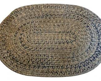 2 - Oval Braided Rug 35"x24" (Description): Oval braided rug in variegated blue, tan, and cream tones. The rug features a classic braided construction with concentric oval pattern. Measures 35 inches by 24 inches.