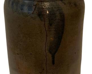 418 - Antique Salt Glazed Stoneware Crock 10"x6" (Description): Antique salt glazed stoneware crock featuring cobalt blue decorative brushwork around the shoulder. The crock has a classic cylindrical form with a rolled rim typical of 19th century American stoneware. Note: the piece has a visible crack running vertically down the body. Measures 10 inches tall by 6 inches in diameter.