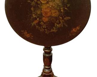 106 - Painted Wood Tilt-Top Table 27.5"x19.5" (Description): A painted wood tilt-top table featuring a round top with hand-painted floral decoration on a black background. The table has a turned pedestal base supported by three curved legs with painted embellishments. Measures 27.5 inches in height by 19.5 inches in diameter.