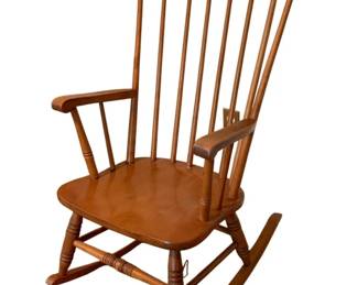 142 - Wood Rocker (Description): A wood rocker featuring a classic spindle back design with curved armrests and turned stretchers.