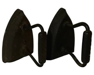 472 - 2 Antique Cast Iron SAD Irons 4"x6"x4" (Description): A pair of antique cast iron SAD irons (Self-heating, Adjustable, Detachable) featuring traditional pointed soleplate designs with fixed wire handles. These heavy flat irons display a dark patina consistent with age and use, representing classic 19th century laundry implements. Each iron measures 4 inches wide by 6 inches long by 4 inches tall including the handle.
