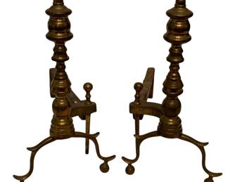 125 - 2 Brass Andirons 15"x19"x8" (Description): A pair of brass andirons featuring turned baluster-form columns with decorative finials. The andirons rest on curved legs with ball feet and include log supports. Measures 15 inches high by 19 inches deep by 8 inches wide.