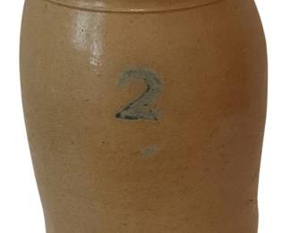 416 - 2 Gallon Stoneware Crock 12"x8" (Description): A classic 2 gallon stoneware crock featuring a tan salt-glazed exterior with a cobalt blue number "2" painted on the front indicating its capacity. The crock has a rolled rim and traditional barrel-shaped form with a dark brown glazed interior. Thiutilitarian piece showcases the characteristic style of 19th century American stoneware pottery. Measures 12 inches tall by 8 inches in diameter.