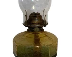 34 - Vtg Amber Glass Oil Lamp w/ Clear Chimney (Description): Vintage amber glass oil lamp featuring a decorative pressed glass base with embossed scroll patterns, a paneled font, brass burner assembly, and clear glass chimney with crimped rim. The lamp measures 18.5 inches tall.
